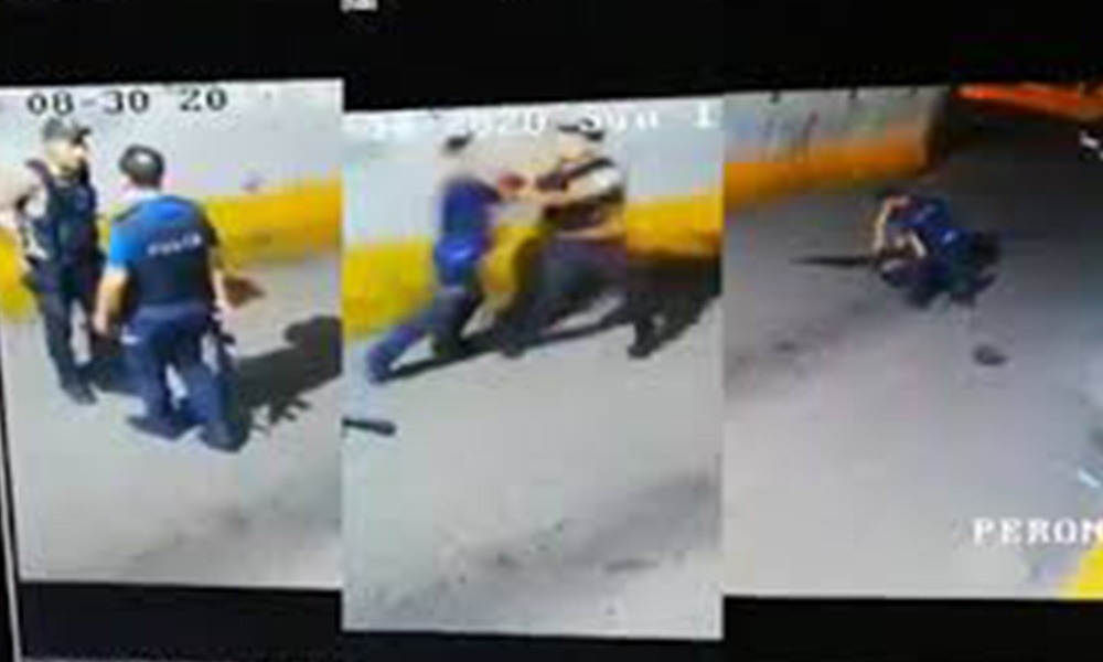 Bir polis ile bekçi sokak ortasında tekme tokat kavga etti!