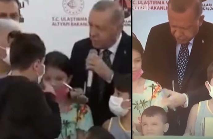 Erdoğan kurdele kesiminde çocuğu, kafasına vurarak uyardı