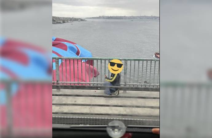 Rambo Okan, köprüdeki Trabzonspor bayrağını indirmeye çalışırken gözaltına alındı