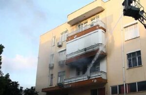 Sinir krizi geçirip balkonu yaktı, eşyaları sokağa attı