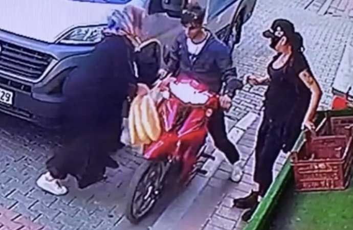 Gözü dönmüş hırsız motosikleti kadının üstüne sürdü
