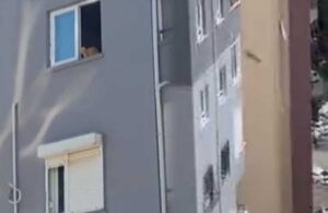 Ağır hasarlı binada mahsur kalan kedi kurtarılmaya çalışılırken 14. kattan atladı