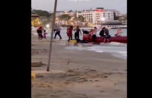 Plajda skandal görüntü! Botla Kuşadası sahillerine çıkan kaçak göçmenler sokaklara dağıldı