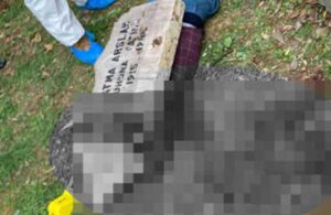 Mezarlıkta tüyler ürperten cinayet! Üzerine mezar taşı konulmuş erkek cesedi bulundu