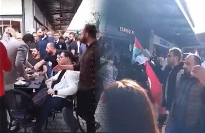 Filistin bayrağıyla Starbucks basıp insanların kahvelerini döktüler!