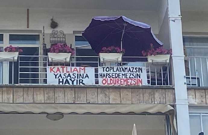 Katliam yasasına balkon pankartlı tepki: Öldüremezsiniz !